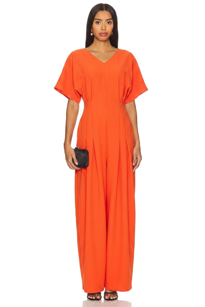 Model wearing a stylish modest midi dress with long sleeves and a high neckline in a subtle floral pattern.