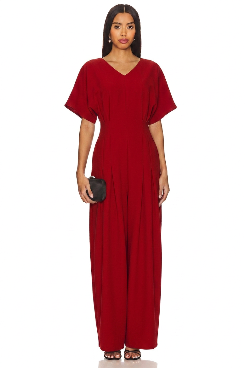 Model wearing a stylish modest midi dress with long sleeves and a high neckline in a subtle floral pattern. - red