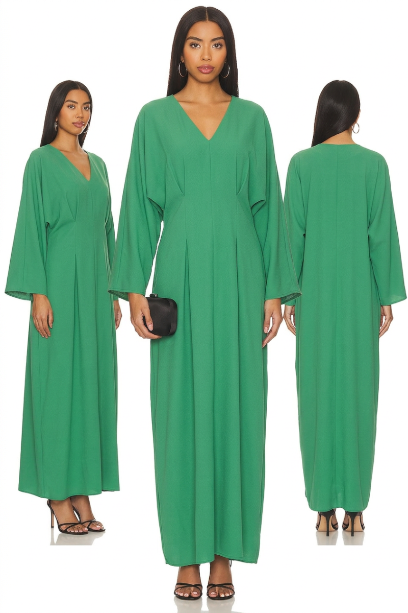 Elegant flowy black abaya with intricate embroidery details and a matching belt on a model in an outdoor setting. - green